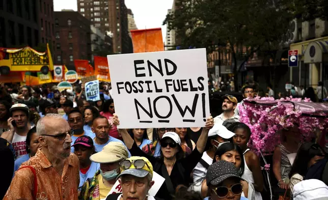 FILE - Climate activists attend a rally to end fossil fuels, in New York, Sept. 17, 2023. (AP Photo/Bryan Woolston, File)