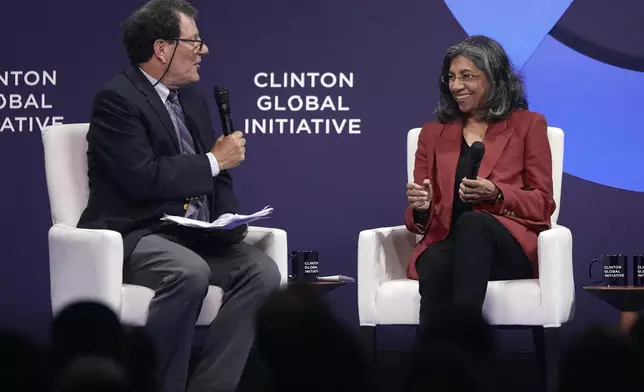 Binaifer Nowrojee, President of Open Society Foundations, right, speaks with a journalist during the Clinton Global Initiative, on Monday, Sept. 23, 2024, in New York. (AP Photo/Andres Kudacki)