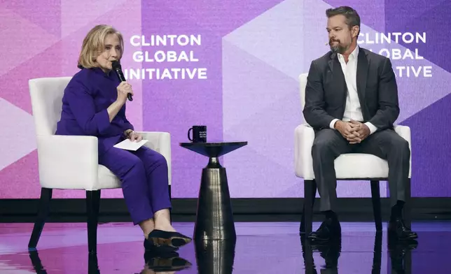 Hillary Clinton, 67th Secretary of State of the United States, left, speaks with. Matt Damon, right, on Monday, Sept. 23, 2024, in New York. (AP Photo/Andres Kudacki)