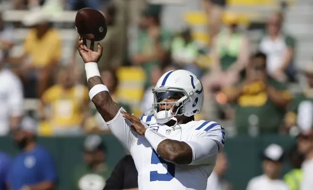 Indianapolis Colts quarterback Anthony Richardson warms up ahead of an NFL football game against the Green Bay Packers Sunday, Sept. 15, 2024, in Green Bay, Wis. (AP Photo/Matt Ludtke)