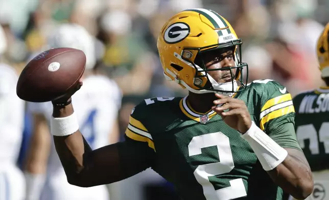 Green Bay Packers quarterback Malik Willis warms up before an NFL football game against the Indianapolis Colts Sunday, Sept. 15, 2024, in Green Bay, Wis. (AP Photo/Mike Roemer)