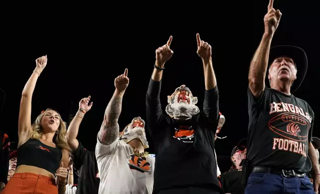 Fans cheer during the second half of an NFL football game between the Cincinnati Bengals and the Washington Commanders, Monday, Sept. 23, 2024, in Cincinnati. (AP Photo/Jeff Dean)