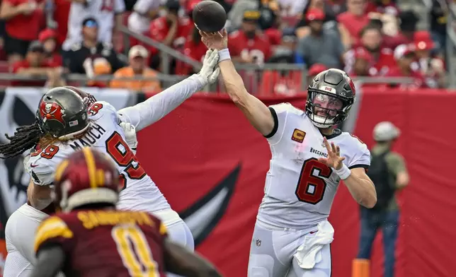 Tampa Bay Buccaneers quarterback Baker Mayfield (6) throws a pass against the Washington Commanders during the first half of an NFL football game Sunday, Sept. 8, 2024, in Tampa, Fla. (AP Photo/Jason Behnken)