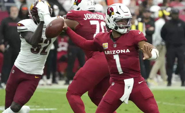 Arizona Cardinals quarterback Kyler Murray (1) throws against the Washington Commanders during the first half of an NFL football game, Sunday, Sept. 29, 2024, in Glendale, Ariz. (AP Photo/Rick Scuteri)