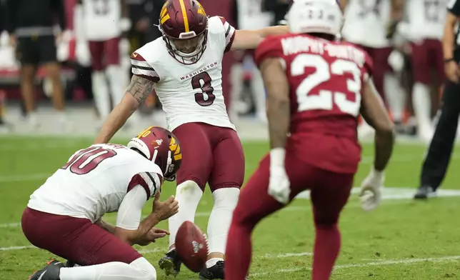 Washington Commanders place kicker Austin Seibert (3) kicks a field goal against the Arizona Cardinals during the first half of an NFL football game, Sunday, Sept. 29, 2024, in Glendale, Ariz. (AP Photo/Ross D. Franklin)