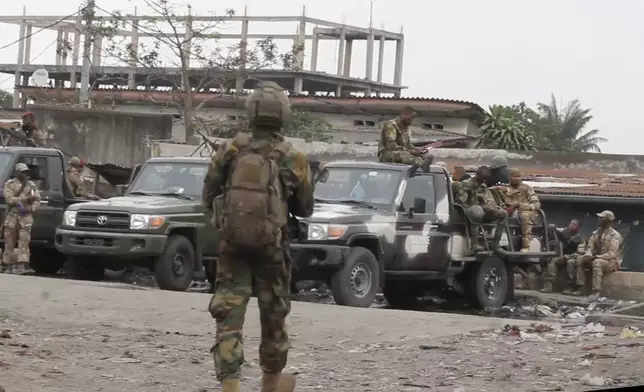 This image made from video shows state security forces outside Makala prison in Kinshasa, Democratic Republic of the Congo, following an attempted jailbreak in Congo's main prison on Monday Sept. 2, 2024. (AP Photo)