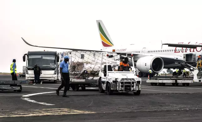 Mpox vaccine MVA-BN vaccine, manufactured by the Danish company Bavarian Nordic, are offloaded from a plane in Kinshasa, Congo, Thursday, Sept. 5, 2024. (AP Photo/Samy Ntumba Shambuyi)