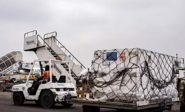 Mpox vaccine MVA-BN vaccine, manufactured by the Danish company Bavarian Nordic, are offloaded from a plane in Kinshasa, Congo, Thursday, Sept. 5, 2024. (AP Photo/Samy Ntumba Shambuyi)