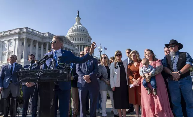 House Foreign Affairs Committee Chairman Michael McCaul, R-Texas, speaks to reporters about his panel's Afghanistan Report and the findings of its three-year investigation into the U.S. withdrawal from Afghanistan, at the Capitol in Washington, Monday, Sept. 9, 2024. He is joined by Republican lawmakers and families of the military members who were killed by a Taliban bomber during the evacuation. (AP Photo/J. Scott Applewhite)