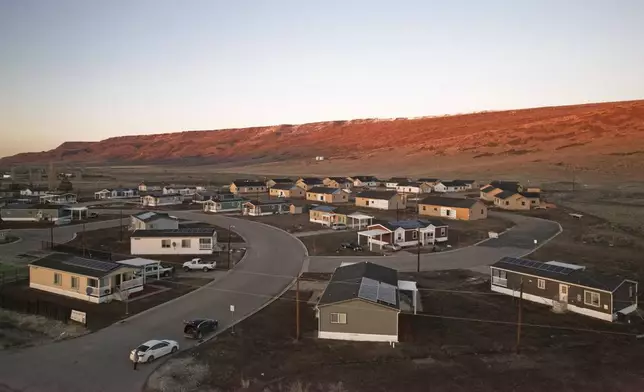 Homes on the Duck Valley Indian Reservation that straddles the Nevada-Idaho border are shown on March 14, 2024, in Owyhee, Nev. (AP Photo/Rick Bowmer)