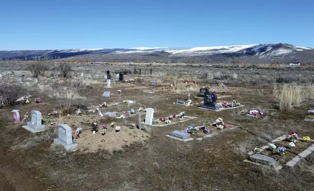 A cemetery in the town of Owyhee, Nev., on the Duck Valley Indian Reservation is pictured on March 13, 2024. (AP Photo/Rick Bowmer)