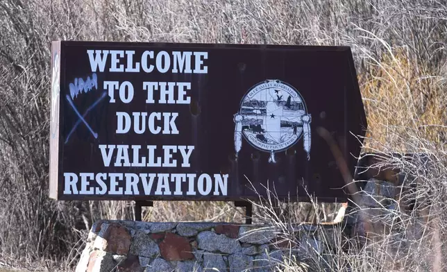 The Duck Valley Indian Reservation sign stands on March 15, 2024, in Owyhee, Nev. (AP Photo/Rick Bowmer)