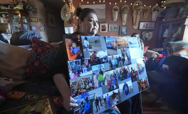 Shoshone-Paiute tribal member Tanya Smith Beaudoin holds photos of her father, who died from cancer, at her home in Owyhee, Nev., on the Duck Valley Indian Reservation on March 14, 2024. (AP Photo/Rick Bowmer)