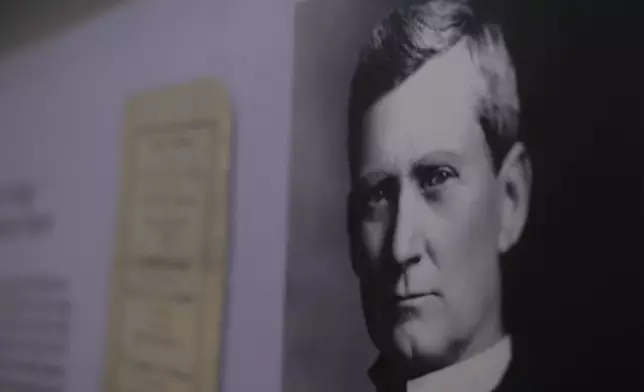 A photo of steamboat captain Tom Ryman is displayed at the Ryman Auditorium in Nashville, Tenn., on July 30, 2024. (AP Photo/Luis Andres Henao)