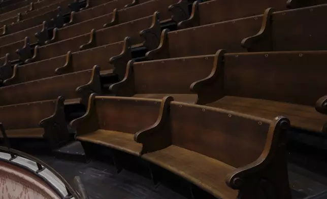 The original wooden pews of the Union Gospel Tabernacle are seen at the Ryman Auditorium in Nashville, Tenn., on July 30, 2024. (AP Photo/Luis Andres Henao)