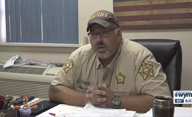 In this image from video provided by WYMT-TV, Letcher County Sheriff Shawn M. Stines speaks during an interview in Whitesburg, Ky., on Aug. 14, 2024. (WYMT-TV via AP)