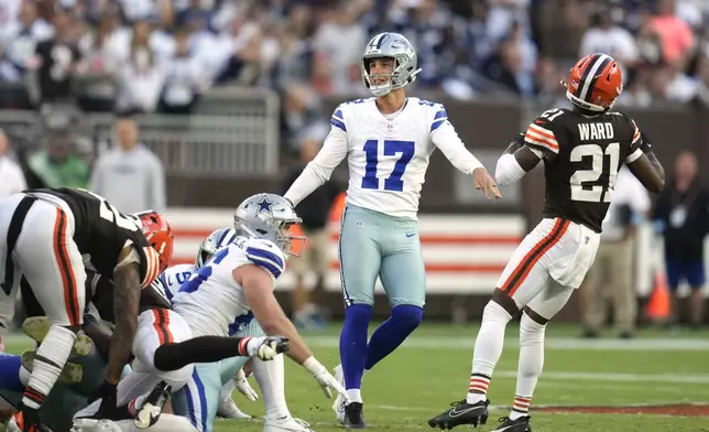 Dallas Cowboys place kicker Brandon Aubrey (17) watches his field goal kick go through the uprights as Cleveland Browns' Denzel Ward (21) jogs away in the second half of an NFL football game in Cleveland, Sunday, Sept. 8, 2024. (AP Photo/Sue Ogrocki)