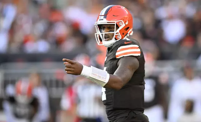 Dallas Cowboys' Dak Prescott (4) gestures at the line of scrimmage in the second half of an NFL football game against the Dallas Cowboys in Cleveland, Sunday, Sept. 8, 2024. (AP Photo/David Richard)