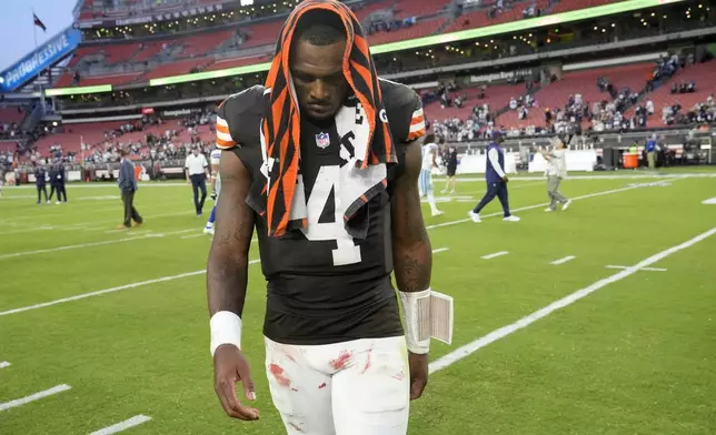 Cleveland Browns' Deshaun Watson walks off the field after an NFL football game against the Dallas Cowboys in Cleveland, Sunday, Sept. 8, 2024. (AP Photo/Sue Ogrocki)