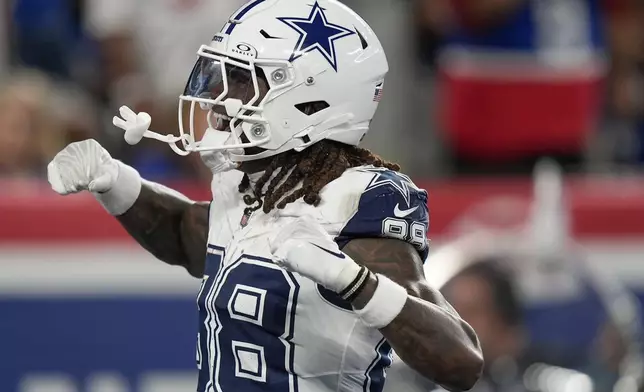 New York Giants wide receiver Bryce Ford-Wheaton (88) celebrates after scoring a touchdown against the New York Giants during the first half of an NFL football game, Thursday, Sept. 26, 2024, in East Rutherford, N.J. (AP Photo/Bryan Woolston)