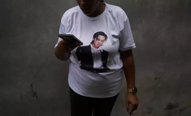 A K-pop follower wears a shirt displaying the image of singer G-Dragon, of Korean band Big Bang, at a cultural house in Havana, Cuba, Saturday, Sept. 7, 2024. (AP Photo/Ramon Espinosa)