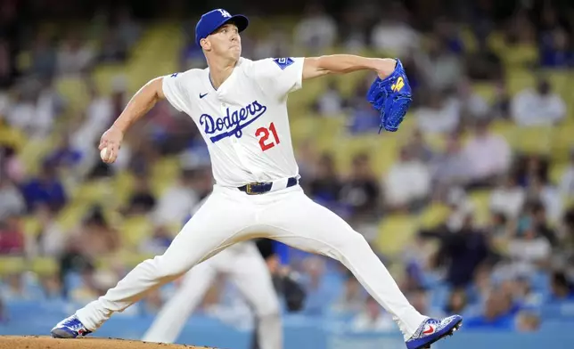 Los Angeles Dodgers starting pitcher Walker Buehler throws to the plate during the first inning of a baseball game against the Chicago Cubs, Monday, Sept. 9, 2024, in Los Angeles. (AP Photo/Mark J. Terrill)