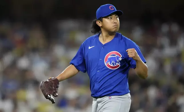 Chicago Cubs starting pitcher Shota Imanaga gestures after Los Angeles Dodgers' Mookie Betts grounded out to end the the third inning of a baseball game, Tuesday, Sept. 10, 2024, in Los Angeles. (AP Photo/Mark J. Terrill)