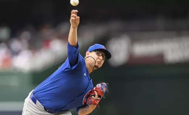 Chicago Cubs starting pitcher Javier Assad throws during the second inning of a baseball game against the Washington Nationals, Saturday, Aug. 31, 2024, in Washington. (AP Photo/John McDonnell)