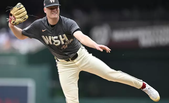 Washington Nationals starting pitcher DJ Herz follows through during the first inning of a baseball game against the Chicago Cubs, Saturday, Aug. 31, 2024, in Washington. (AP Photo/John McDonnell)