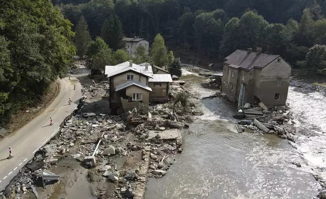 A view of damaged houses after recent floods near Pisecna, Czech Republic, Thursday, Sept. 19, 2024. (AP Photo/Petr David Josek)