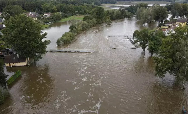 A view of flooded streets in Plav, Czech Republic, Tuesday, Sept. 17, 2024. (AP Photo/Stanislav Hodina)