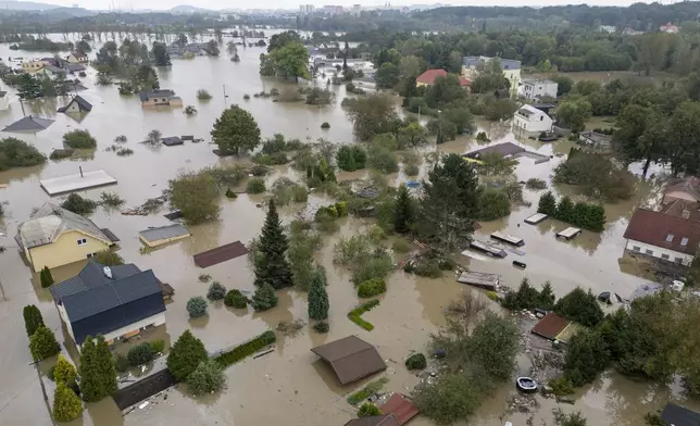 An aerial view of a flooded neighbourhood in Ostrava, Czech Republic, Monday, Sept. 16, 2024. (AP Photo/Darko Bandic)