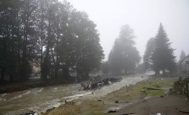 View of the destroyed bridge after recent floods in Jesenik, Czech Republic, Monday, Sept. 16, 2024. (AP Photo/Petr David Josek)