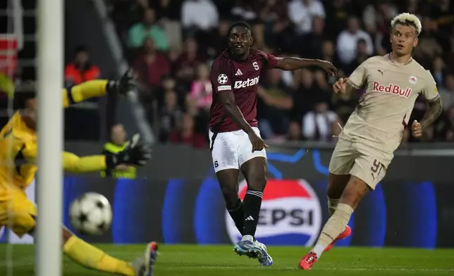 Sparta's Victor Olatunji scores his side's second goal during the Champions League opening phase soccer match between Sparta Prague and Salzburg in Prague, Czech Republic, Wednesday, Sept. 18, 2024. (AP Photo/Petr David Josek)