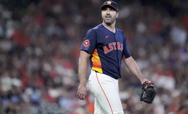 Houston Astros starting pitcher Justin Verlander reacts after giving up a grand slam to Arizona Diamondbacks' Pavin Smith during the third inning of a baseball game Sunday, Sept. 8, 2024, in Houston. (AP Photo/Eric Christian Smith)