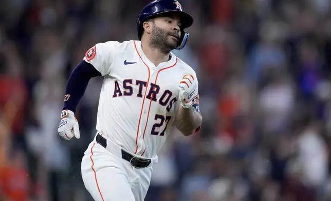 Houston Astros' Jose Altuve rounds the bases after hitting a solo home run against the Arizona Diamondbacks during the seventh inning of a baseball game, Saturday, Sept. 7, 2024, in Houston. (AP Photo/Eric Christian Smith)