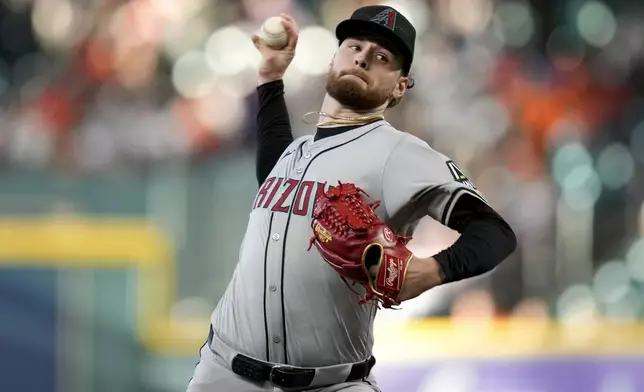 Arizona Diamondbacks starting pitcher Ryne Nelson throws against the Houston Astros during the first inning of a baseball game, Sunday, Sept. 8, 2024, in Houston. (AP Photo/Eric Christian Smith)