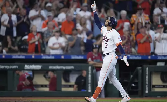 Houston Astros' Jeremy Pena celebrates his three-run home run against the Arizona Diamondbacks during the sixth inning of a baseball game, Saturday, Sept. 7, 2024, in Houston. (AP Photo/Eric Christian Smith)