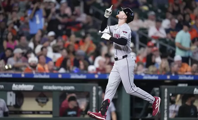 Arizona Diamondbacks' Pavin Smith celebrates after his grand slam against the Houston Astros during the third inning of a baseball game Sunday, Sept. 8, 2024, in Houston. (AP Photo/Eric Christian Smith)