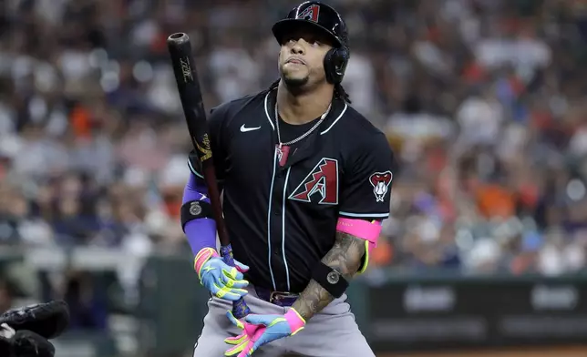 Arizona Diamondbacks designated hitter Ketel Marte steps up for his first at-bat after coming off an injury against the Houston Astros on his return during the first inning of a baseball game, Friday, Sept. 6, 2024, in Houston. (AP Photo/Michael Wyke)