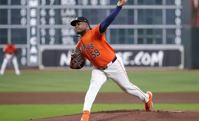 Houston Astros starting pitcher Framber Valdez throws against the Arizona Diamondbacks during the first inning of a baseball game Friday, Sept. 6, 2024, in Houston. (AP Photo/Michael Wyke)