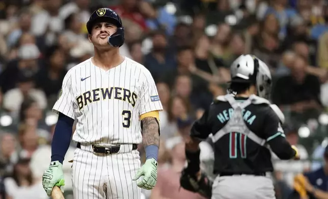 Milwaukee Brewers' Joey Ortiz (3) reacts after striking out during the fifth inning of a baseball game against the Arizona Diamondbacks, Saturday, Sept. 21, 2024, in Milwaukee. (AP Photo/Aaron Gash)