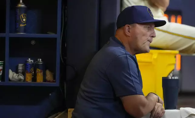 Milwaukee Brewers manager Pat Murphy watches from the dugout during the sixth inning of a baseball game against the Arizona Diamondbacks Thursday, Sept. 19, 2024, in Milwaukee. (AP Photo/Morry Gash)