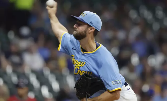 Milwaukee Brewers pitcher Colin Rea (48) throws in the first inning of a baseball game against the Arizona Diamondbacks, Friday, Sept. 20, 2024, in Milwaukee. (AP Photo/Jeffrey Phelps)