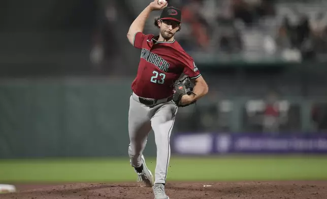 Arizona Diamondbacks pitcher Zac Gallen works against the San Francisco Giants during the sixth inning of a baseball game in San Francisco, Wednesday, Sept. 4, 2024. (AP Photo/Jeff Chiu)