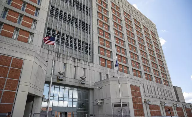 FILE - The Metropolitan Detention Center in the Brooklyn borough of New York is shown Tuesday, July 14, 2020. (AP Photo/John Minchillo, File)