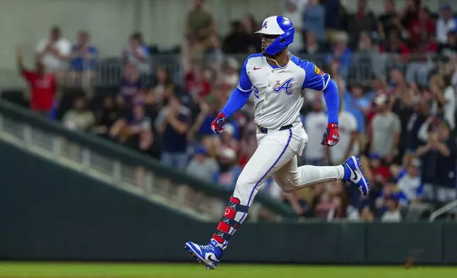 Atlanta Braves' Jorge Soler runs to second base after hitting a double in the third inning of a baseball game against the Los Angeles Dodgers, Saturday, Sept. 14, 2024, in Atlanta. (AP Photo/Jason Allen)