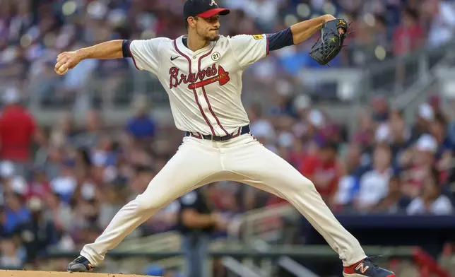 Atlanta Braves pitcher Charlie Morton throws in the first inning of a baseball game against the Los Angeles Dodgers, Sunday, Sept. 15, 2024, in Atlanta. (AP Photo/Jason Allen)