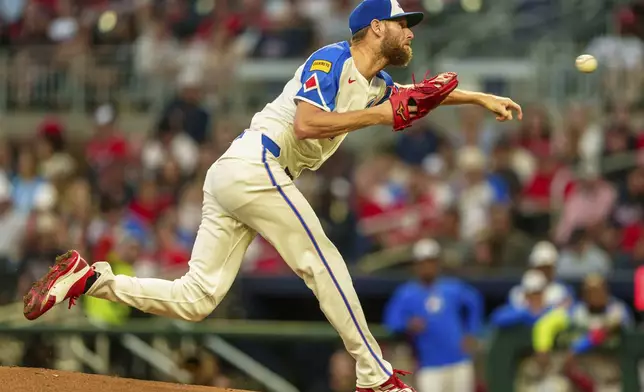 Atlanta Braves pitcher Chris Sale throws in the first inning of a baseball game against the Los Angeles Dodgers, Saturday, Sept. 14, 2024, in Atlanta. (AP Photo/Jason Allen)