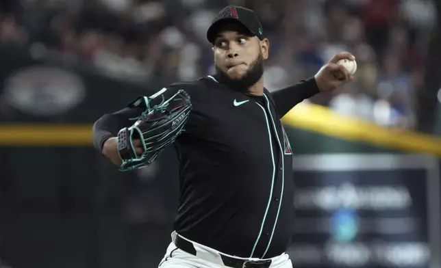 Arizona Diamondbacks pitcher Eduardo Rodriguez throws against the Los Angeles Dodgers in the third inning during a baseball game, Monday, Sept. 2, 2024, in Phoenix. (AP Photo/Rick Scuteri)